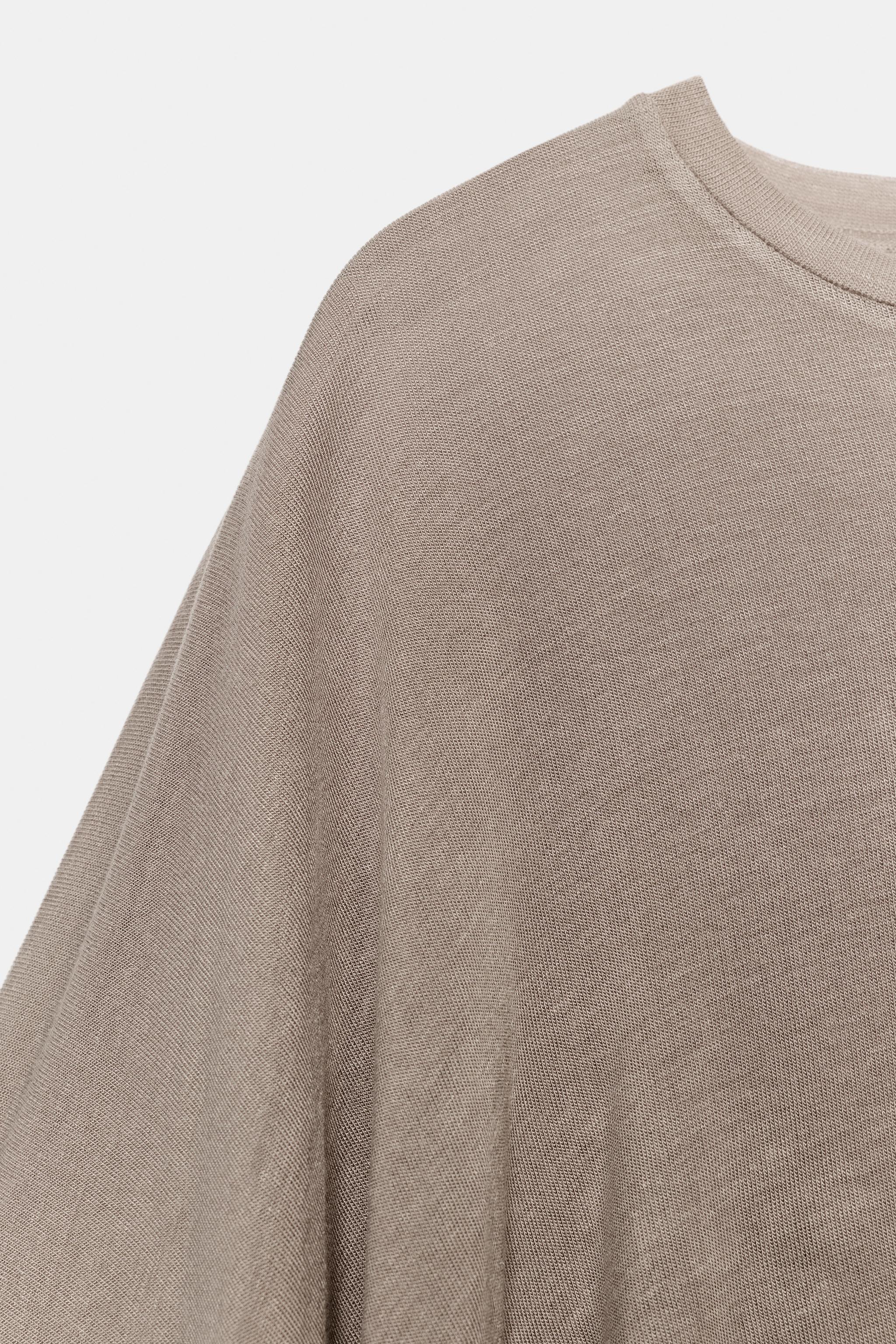 ASYMMETRIC CAPE TOP